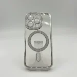 قاب دخترانه (کاور، گارد، کیس) آیفون 16 پرو (iphone 16 pro) شفاف نگین شاین دار براق اکلیلی مگ سیف مگنتی محافظ لنز دار شیشه ای نقره ای