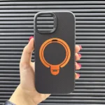 قاب (کاور، گارد، کیس) آیفون 15 نرمال (iphone 15) فیبر کربن هولدر استند دار، مگ سیف و محافظ لنز دار مشکی و نارنجی پسرانه